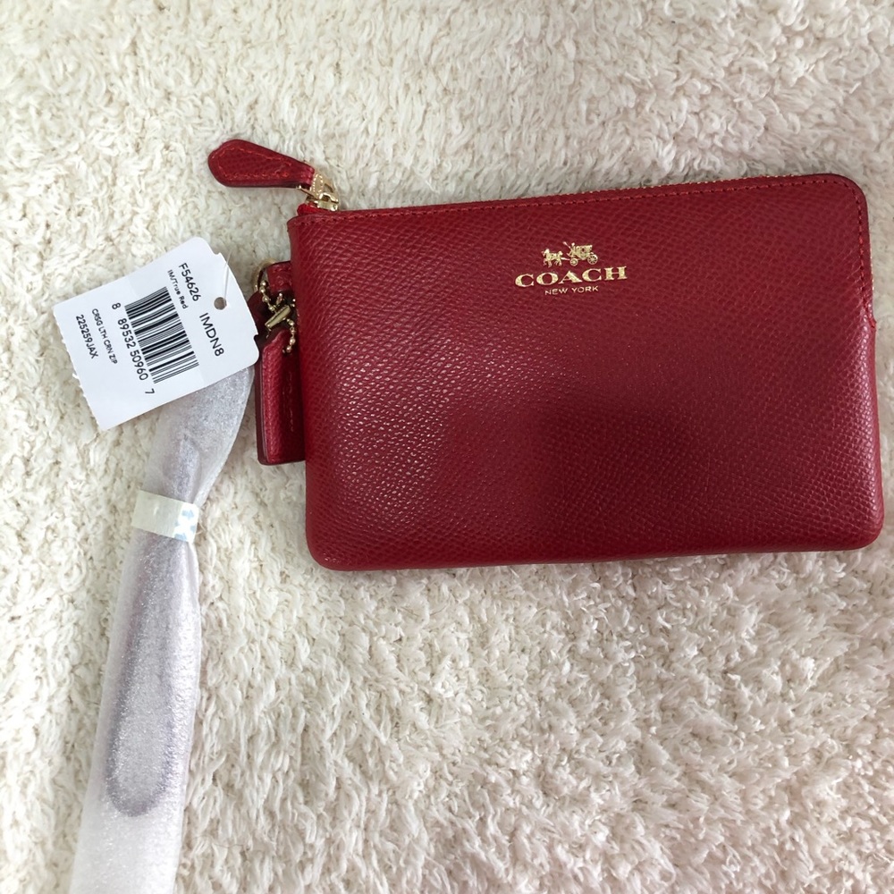 Coach wristlet, new with tags. Card holder inside